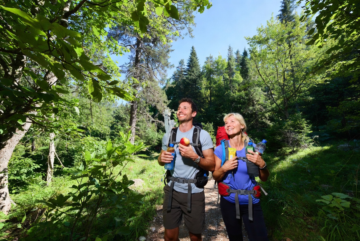 Person doing a short standing stretch near a home office desk